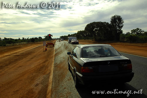 Back on the Barrier Highway, NSW Australia and held up by a traffic light? Roadworks on the way to Wilicannia. Photo copyright Peter Andrews, Outimage Australia.