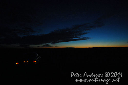 Last light between Wilcannia and Broken Hill on the Barrier Highway, NSW Australia, with about 50 km to go. Photo copyright Peter Andrews, Outimage Australia.