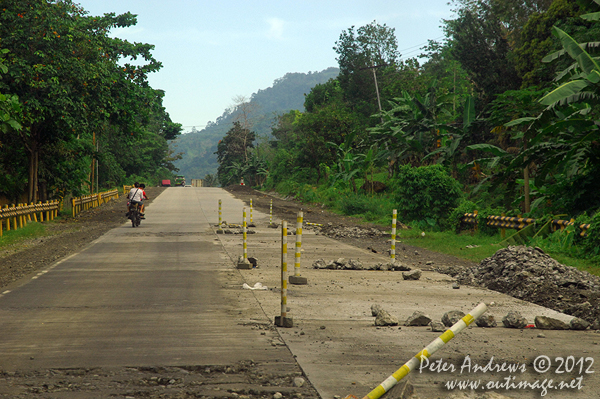 More and more roadworks along the highway to Kidapawan City, Davao del Sur Province, Mindanao, Philippines. Photo copyright Peter Andrews, Outimage Australia.