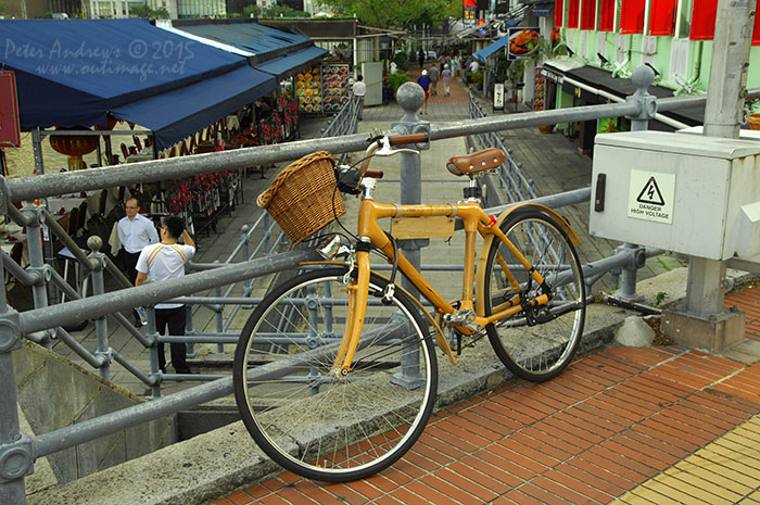 A neat looking bike chained to the the rails of the Elgin Bridge, above the Boat Quay pedestrian tunnel under South Bridge Road. Photo © Peter Andrews / Outimage. Walking from Circular Road to Chinatown in Singapore as the city prepares for the Lunar New Year.