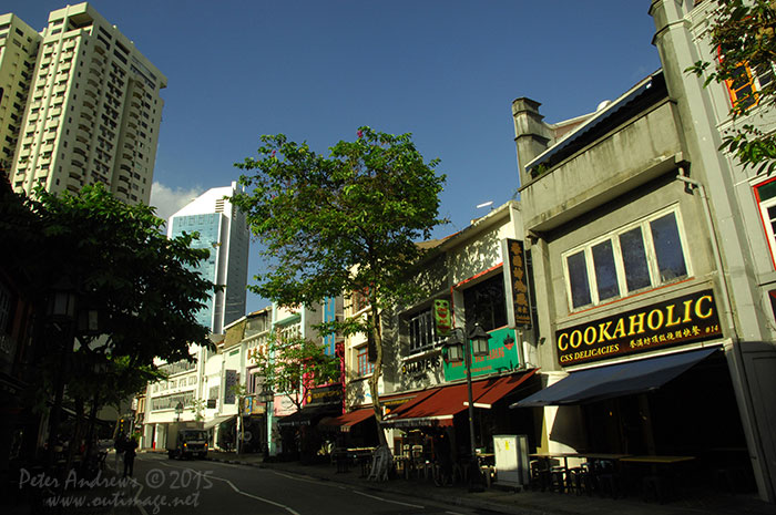 The restaurants and small bars along Circular Road at Boat Quay in Singapore prepare for another busy evening of trade. Photo © Peter Andrews / Outimage. Walking from Circular Road to Chinatown in Singapore as the city prepares for the Lunar New Year.