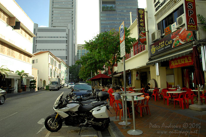 The view down Lorong Telok from its junction with Circular Road, looking towards Singapore's central business district. Photo © Peter Andrews / Outimage. Walking from Circular Road to Chinatown in Singapore as the city prepares for the Lunar New Year.