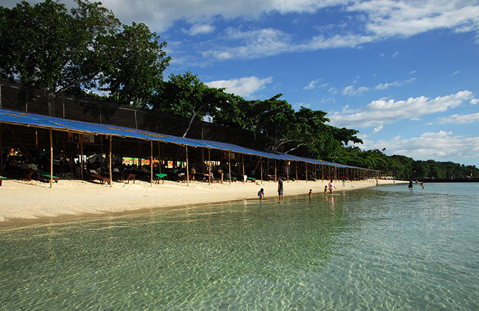 Low tide beach scene of Paradise Island Beach on Samal Island.