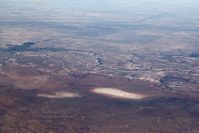 Dry lake beds and river valleys near Muttaburra, Outback Queensland. 21°54'29.6"S 144°49'12.2"E. High altitude shots from a flight between Sydney Australia and Manila, Philippines.