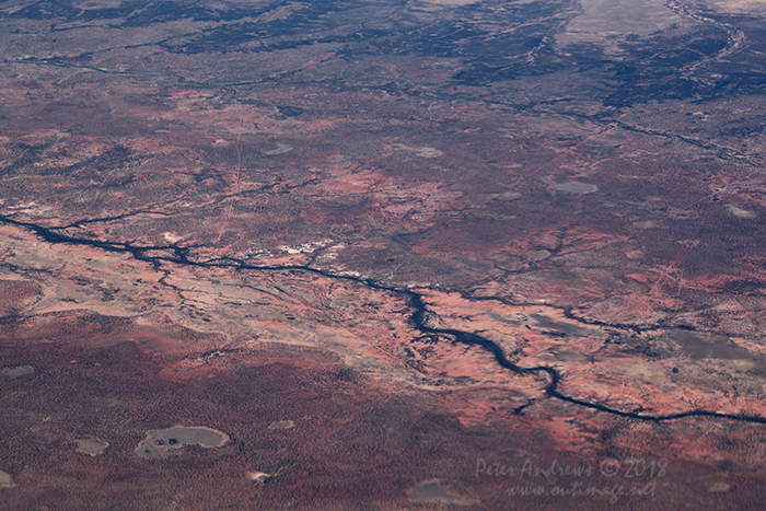 Dry river valleys near Kooroorinya Falls, between Prairie and Muttaburra, Outback Queensland. 21°31'59.8"S 144°36'51.0"E. High altitude shots from a flight between Sydney Australia and Manila, Philippines.