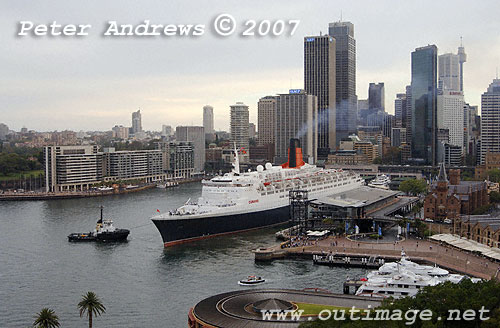 With all lines free the QE2 departs the Overseas Passenger Terminal at Circular Quay, Sydney.