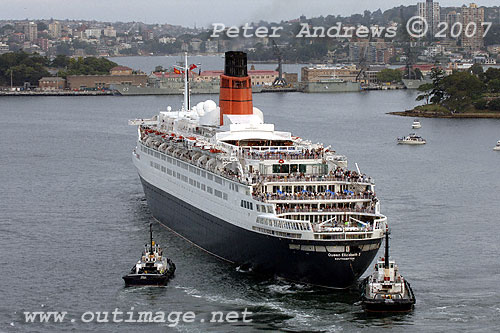 QE2 escorted down Sydney Harbour by the tugs Korimul from Port Kembla NSW and the local tug Wooli.