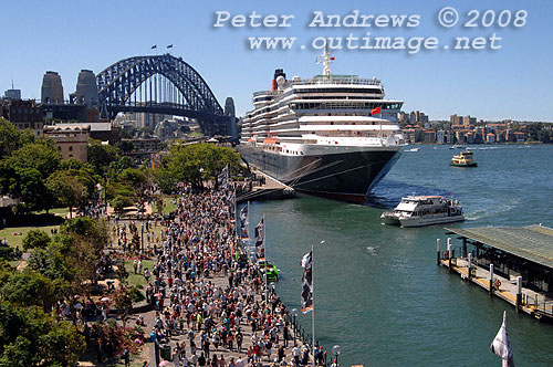 Queen Victoria and the vibrant Circular Quay foreshore in Sydney.
