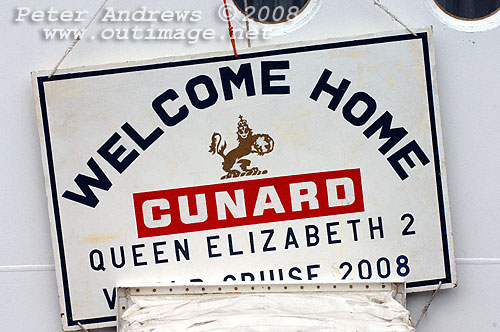 A welcome home sign above the main gangway for passengers of the Queen Elizabeth 2.