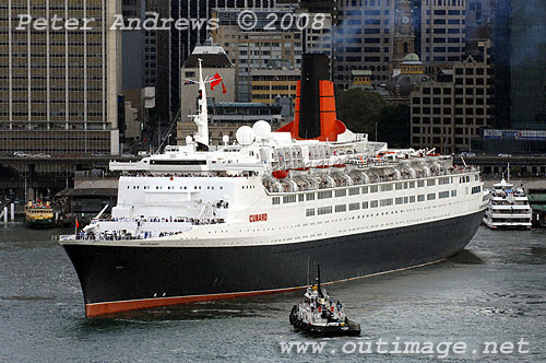 Queen Elizabeth II steaming out of Circular Quay, leaving Sydney Harbour for the last time after 30 years service including 29 visits to Sydney. Photo copyright Peter Andrews, Outimage.