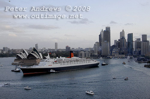 Queen Elizabeth 2 leaving Circular Quay in front of the Sydney Opera House.