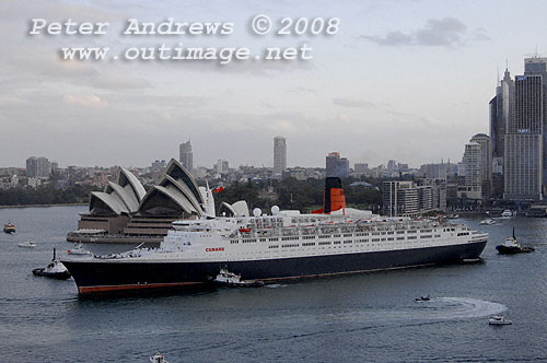 Queen Elizabeth 2 leaving Circular Quay in front of the Sydney Opera House.