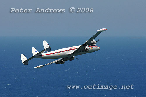 The Illawarra based Historical Aircraft Restoration Society's (HARS) Lockheed Super Constellation, Connie, flying over Stanwell Park, NSW Australia. Photo copyright Peter Andrews.