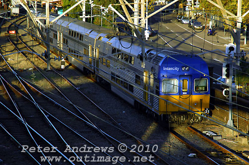 Evening train to Sydney leaving Newcastle. Photo copyright Peter Andrews, Outimage Publications.