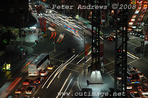 Pedestrians wait for the traffic at Sydney's Railway Square. Photo copyright Peter Andrews 2008, Outimage Publications.
