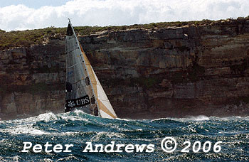 Geoff Lavis' Inglis 50 UBS Wild Thing, behind a wave at the heads after the start of the 2006 Sydney to Gold Coast Yacht Race.