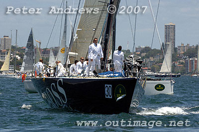 The crew on Tony Fisher's Volvo 60 Hugo Boss dressed for some champagne sailing out of Sydney Harbour.