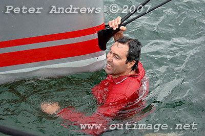 Skipper Mark Richards taking a swim at the bow.