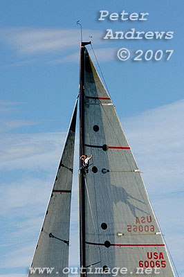 The shadow of Justin Clougher extends across the top of the mainsail.