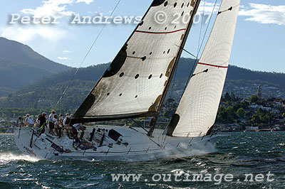 With Hobart and the finishing line now in sight, Rosebud is seen here flying up the Derwent River just off Sandy Bay.