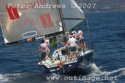Onorato's Mascalzone Latino setting spinnaker for their final run down to the finish.