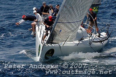 Brett Neill's White Cloud about to round the top mark, during the 2007 Rolex Trophy One Design Series. Photo copyright Peter Andrews.