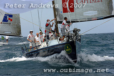 Vincenzo Onorato's <em>Mascalzone Latino</em> in second place running down to the line under spinnaker.