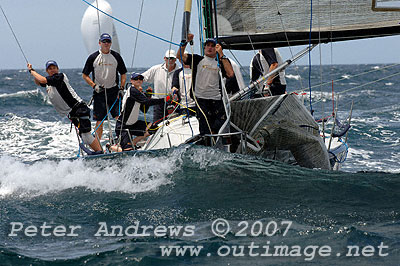 Lang Walker ploughing up the Pacific Ocean with his Farr 40 Kokomo under spinnaker during the 2007 Rolex Trophy One Design Series. Photo copyright Peter Andrews.