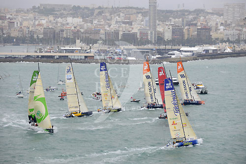 The fleet of second generation Volvo Open 70's break from the start line in Alicante, Spain for leg 1 of The Volvo Ocean Race. Next is a 6,500nm battle to Cape Town, South Africa. Photo copyright Rick Tomlinson - Volvo Ocean Race.