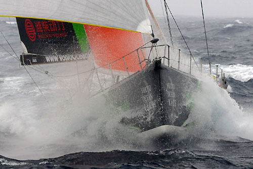 Green Dragon ploughs through a wave offshore after the start of leg 1 of The Volvo Ocean Race. Photo copyright Dave Kneale - Volvo Ocean Race.