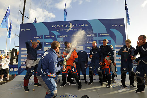 Crew of Ericsson 3 get a blast of champagne in Cape Town. Photo copyright Rick Tomlinson - Volvo Ocean Race. 