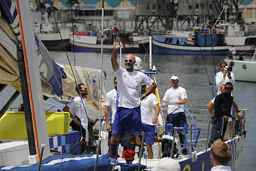 Telefonica Blue's Skipper Bouwe Bekking from the Netherlands waves to the crowd. Photo copyright Rick Tomlinson - Volvo Ocean Race.
