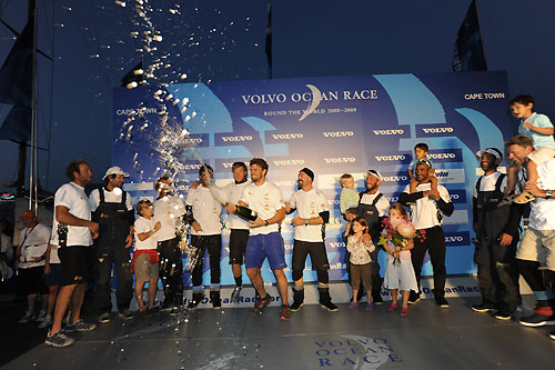 The crew of Telefonica Black celebrate finishing leg 1. Photo copyright Rick Tomlinson - Volvo Ocean Race. 