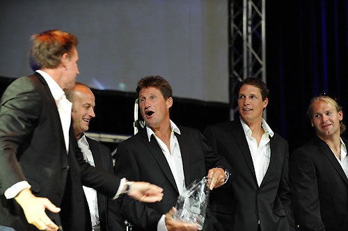 PUMA Ocean Racing skipper Ken Read gives Bowman Jerry Kirby their Waterford Trophy for second place at the leg 1 Prize Giving in Cape Town, South Africa. Volvo Ocean Race leg 1 Prize Giving Ceremony. Photo copyright Rick Tomlinson / Volvo Ocean Race.