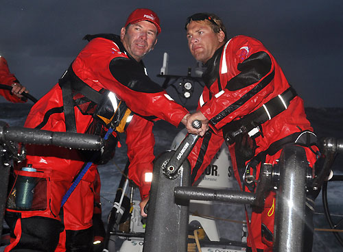 Rob Salthouse and Michael Muller on the grinder at dusk, on leg 2 of the Volvo Ocean Race, from Cape Town, South Africa, to Cochin, India. Photo copyright Rick Deppe / PUMA Ocean Racing / Volvo Ocean Race.