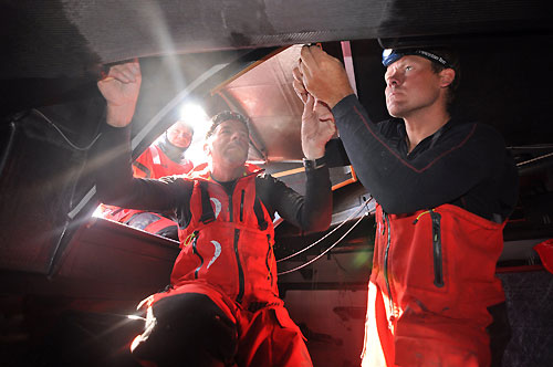 Rob Salthouse (left) from New Zealand and Casey Smith from Australia. The crew of PUMA Ocean Racing make repairs to their boat after sustaining serious structural damage in rough seas, for the second time in 24 hours. Photo copyright Rick Deppe / PUMA Ocean Racing / Volvo Ocean Race.