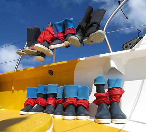 Team Russia hang their boots out to dry, on leg 2 of the Volvo Ocean Race, from Cape Town, South Africa to Cochin, India. Photo copyright Mark Covell / Team Russia / Volvo Ocean Race.