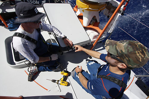 Dave Endean and Phil Jameson repair a broken helmsman foot chock, on leg 2 of the Volvo Ocean Race, from Cape Town, South Africa to Cochin, India. Photo copyright Guy Salter / Ericsson 4 / Volvo Ocean Race.