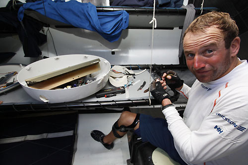 Jens Dolmer trying to bring life back to Ericsson 3's radar, on leg 2 of the Volvo Ocean Race, from Cape Town, South Africa to Cochin, India. Photo copyright Gustav Morin / Ericsson 3 / Volvo Ocean Race.