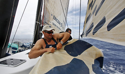 Richard Mason changing sails onboard Ericsson 4, in light shitfy breeze just before the Doldrums, on leg 2 of the Volvo Ocean Race, from Cape Town, South Africa to Cochin, India. Photo copyright Gustav Morin / Ericsson 3 / Volvo Ocean Race.