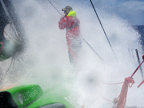 Andrew McLean checks the mast in rough conditions, onboard Green Dragon, during leg 2 of the Volvo Ocean Race, from Cape Town, South Africa to Cochin, India. Photo copyright Guo Chuan / Green Dragon Racing / Volvo Ocean Race.
