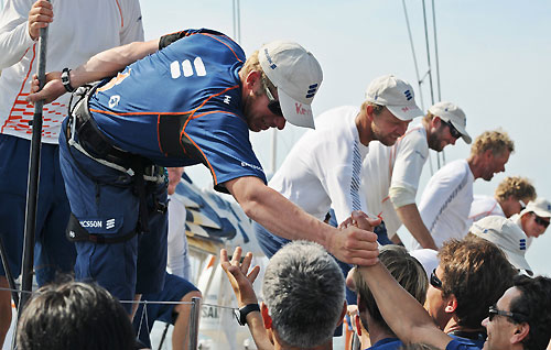 Bowman Martin Krite from Sweden is greeted by the shore crew. Ericsson 3, skippered by Anders Lewander from Sweden, finishes third on leg 2 of the Volvo Ocean Race from Cape Town, South Africa to Cochin, India. Photo copyright Dave Kneale / Volvo Ocean Race.