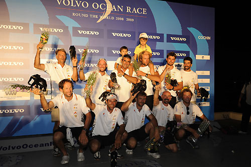 The crew of Telefonica Black, skippered by Fernando Echavarri from Spain, celebrate their arrival in Cochin after finishing leg 2 of the Volvo Ocean Race from Cape Town, South Africa to Cochin, India. Photo copyright Rick Tomlinson / Volvo Ocean Race.
