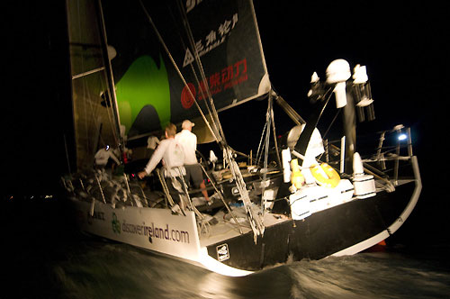 Green Dragon, skippered by Ian Walker from UK, finishes leg 2 of the Volvo Ocean Race from Cape Town, South Africa to Cochin, India. They crossed the line without their boom which broke during the leg, at 13:08:20 GMT, securing 2 points for the finish and 5 points overall for the leg. Photo copyright Dave Kneale / Volvo Ocean Race.