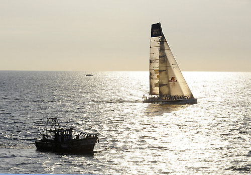 Telefonica Black, skippered by Fernando Echavarri from Spain, finishes leg 2 of the Volvo Ocean Race from Cape Town, South Africa to Cochin, India. They crossed the line at 12:00:20 GMT, securing 5 points for the finish and 6.5 points overall for the leg. Photo copyright Rick Tomlinson / Volvo Ocean Race.