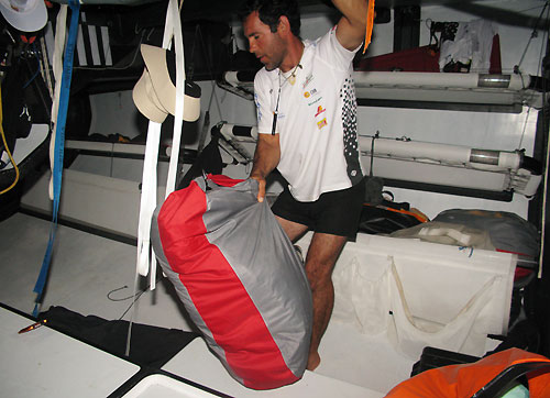 Pablo Iglesias stacking below decks on Telefonica Black, on leg 3 of the Volvo Ocean Race from India to Singapore. Photo copyright Mikel Pasabant / Telefonica Black / Volvo Ocean Race.