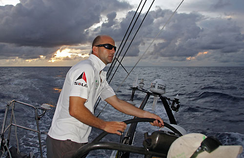 Green Dragon skipper Ian Walker with moody skies in the background, on leg 3 of the Volvo Ocean Race from India to Singapore. Photo copyright Guo Chuan / Green Dragon Racing / Volvo Ocean Race.