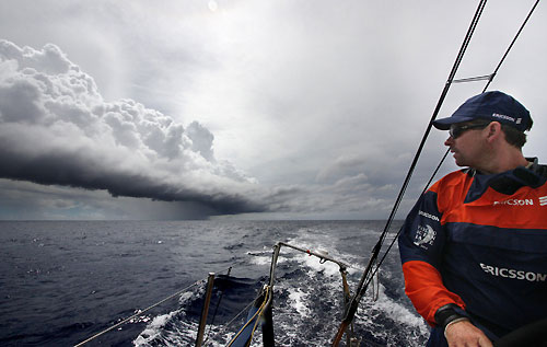 Brad Jackson watching a storm cloud, onboard Ericsson 4, on leg 3 of the Volvo Ocean Race from India to Singapore. Photo copyright Guy Salter / Ericsson 4 / Volvo Ocean Race.