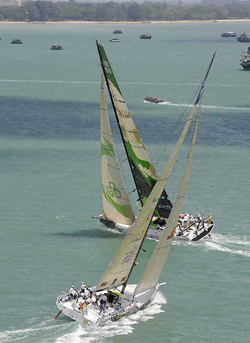 Telefonica Black, skippered by Fernando Echavarri (ESP) chases Green Dragon, skippered by Ian Walker (GBR) at the start of leg 4 of the Volvo Ocean Race, from Singapore to Qingdao, China. Photo copyright Rick Tomlinson / Volvo Ocean Race.
