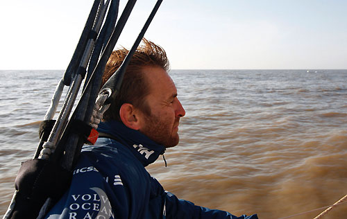 Jules Salter looks out for fishing traps onboard Ericsson 4, on leg 4 of the Volvo Ocean Race, from Singapore to Qingdao, China. Photo copyright Guy Salter / Ericsson 4 / Volvo Ocean Race.